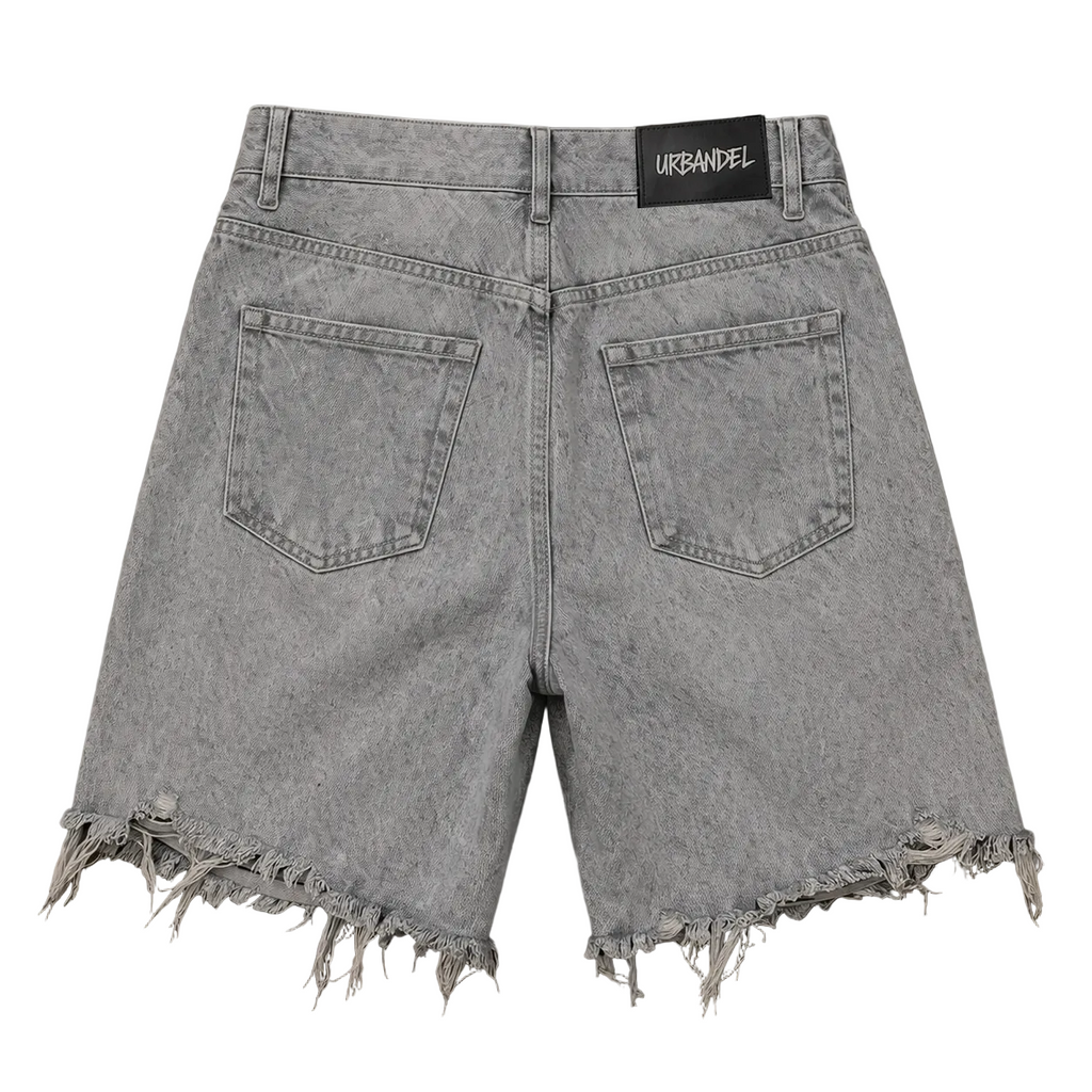 Concrete Drip” Distressed Denim Shorts